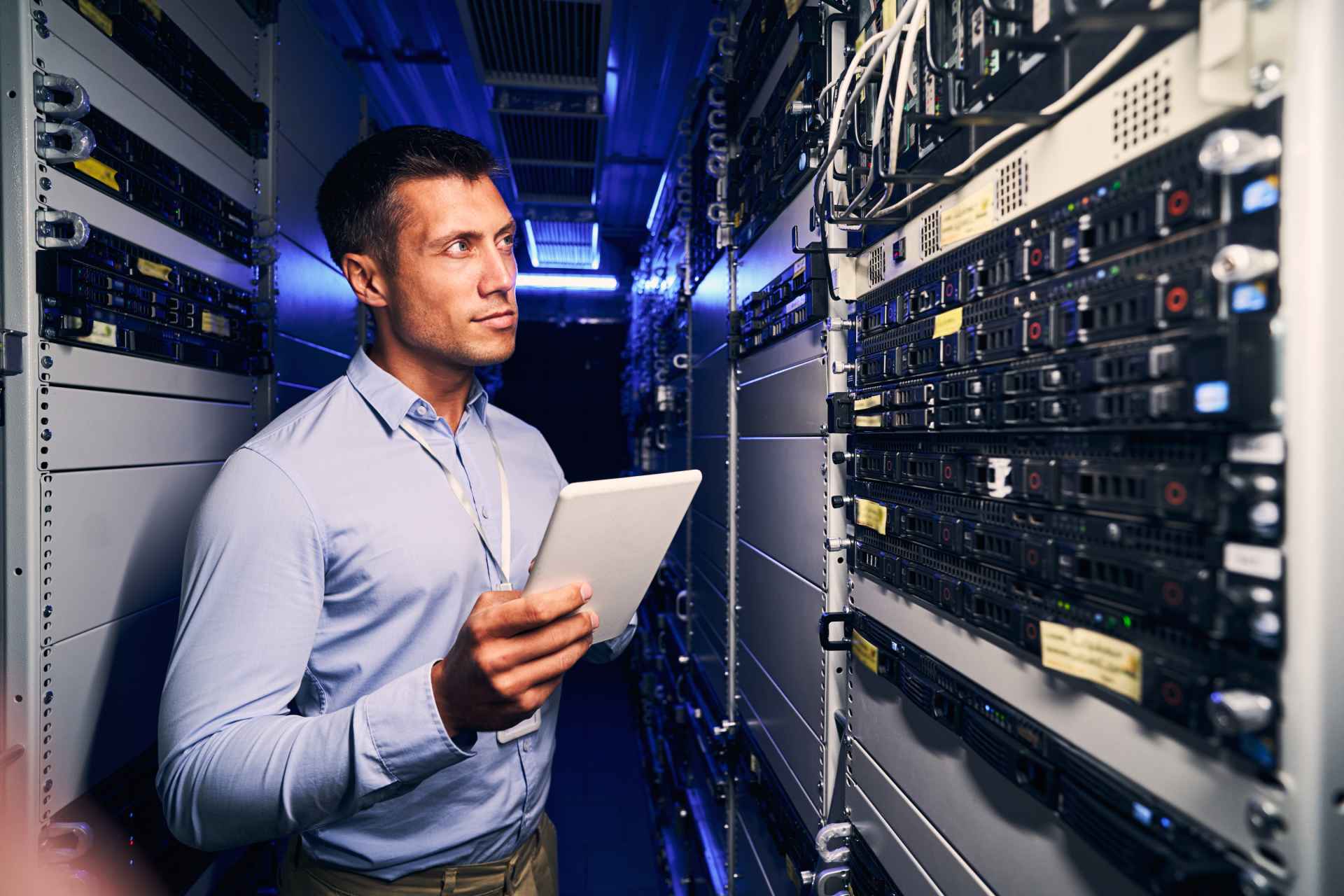 Engineer checking networking equipment